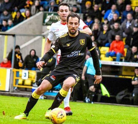 Dae Ollolai a su Livingston jocande su football iscotzesu 