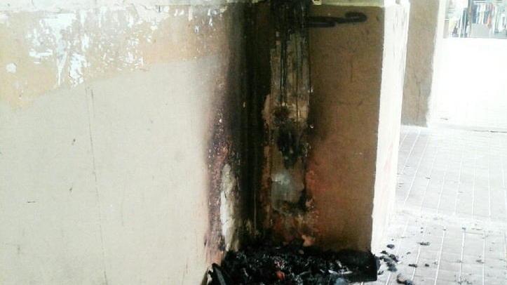 Incendio sotto le logge del Piazzone