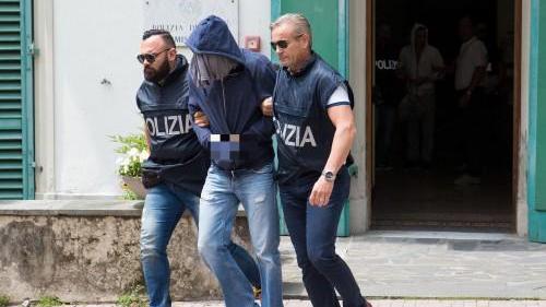 Omar Emilio Cuevas Perez viene portato in carcere (foto Nucci)