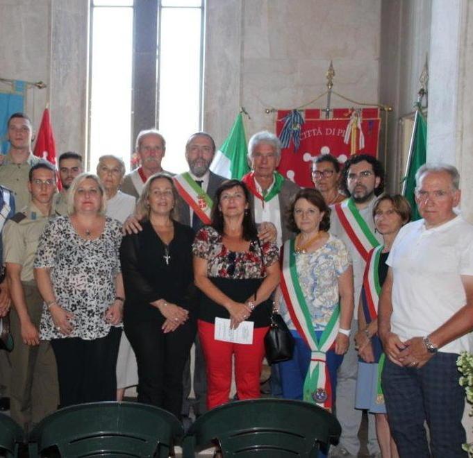 Una lapide commemorativa alla casa di don Fiore Menguzzo 