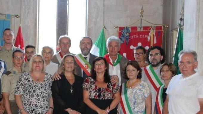 Una lapide commemorativa alla casa di don Fiore Menguzzo