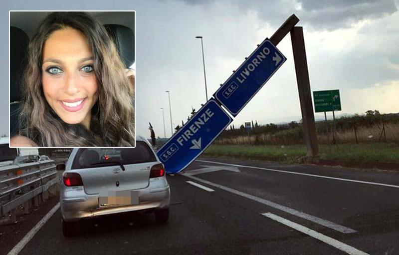 Paola Fioretto e il cartello crollato sulla Fi-Pi-Li