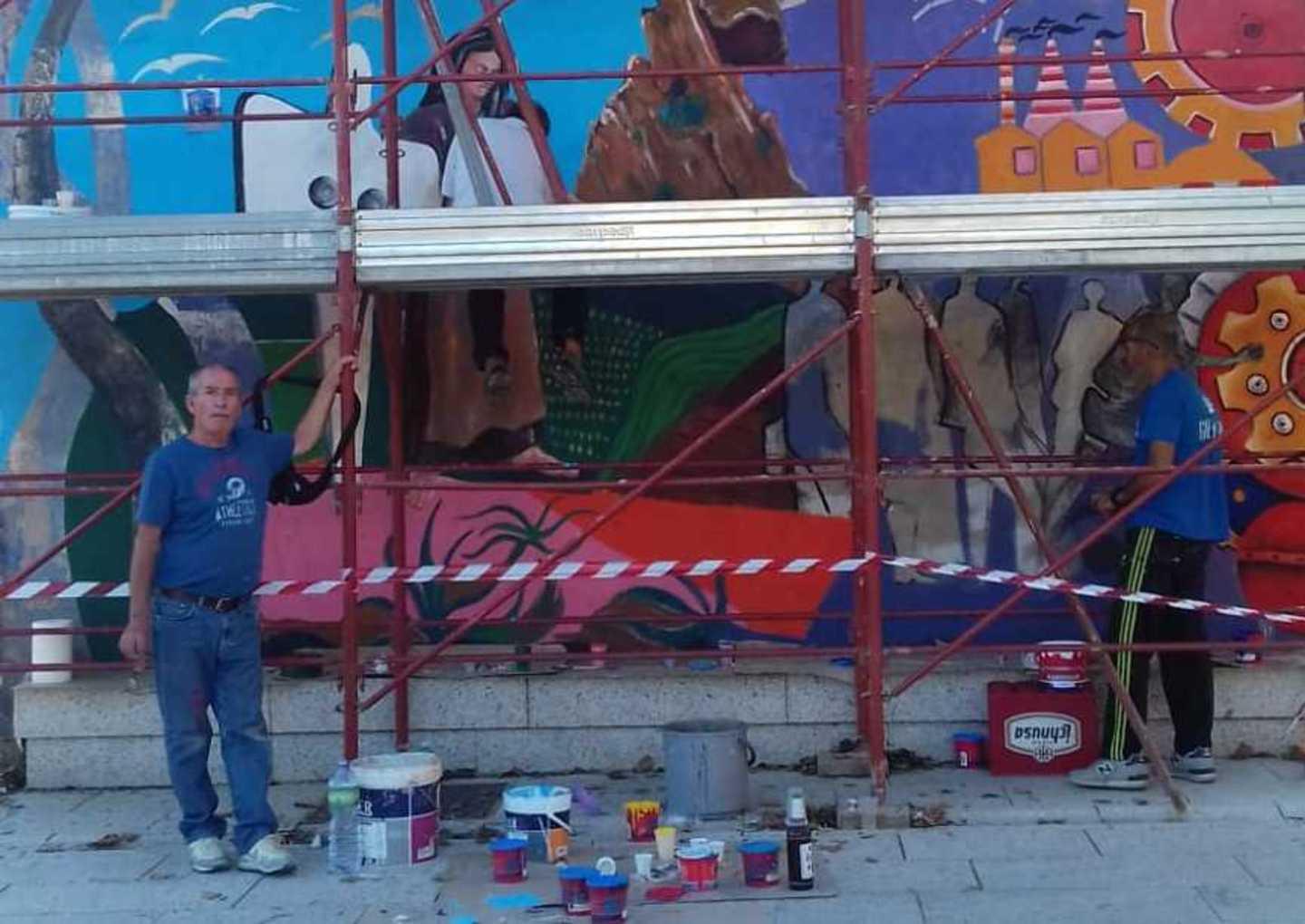 Austis, restaurato il murale di Medda 