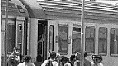 Viaggiatori alla stazione di Campiglia