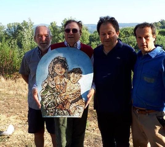 I volontari con la Madonna ritrovata