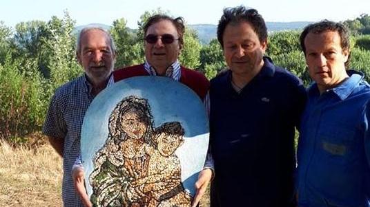 I volontari con la Madonna ritrovata
