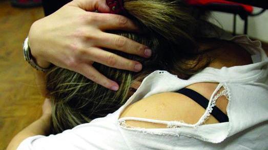 Una donna vittima di violenza
