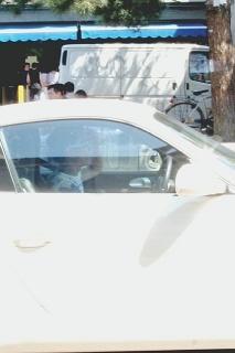 L’assessore Giorgio Silli e un cinese al volante