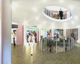 La ricostruzione grafica al computer mostra l’atrio con la galleria commerciale, l’autosilos e la rampa d’accesso del parcheggio (visti lato nord) e un particolare della facciata su largo Valdesi