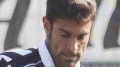 A destra il difensore Briglia; accanto mister Paolo Moschetti