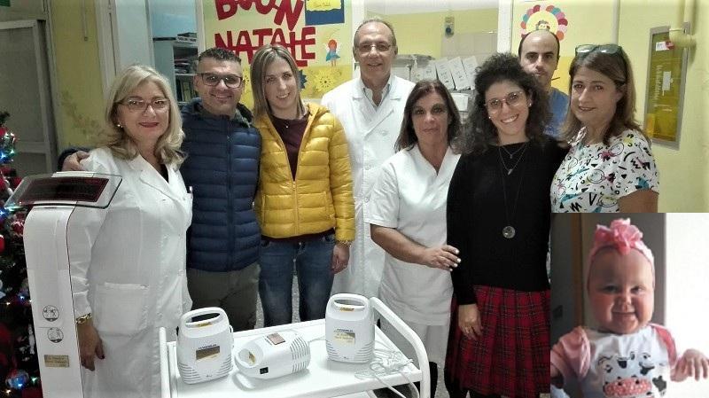 La donazione della bilancia all'Aou e, nel riquadro, la piccola Chiara