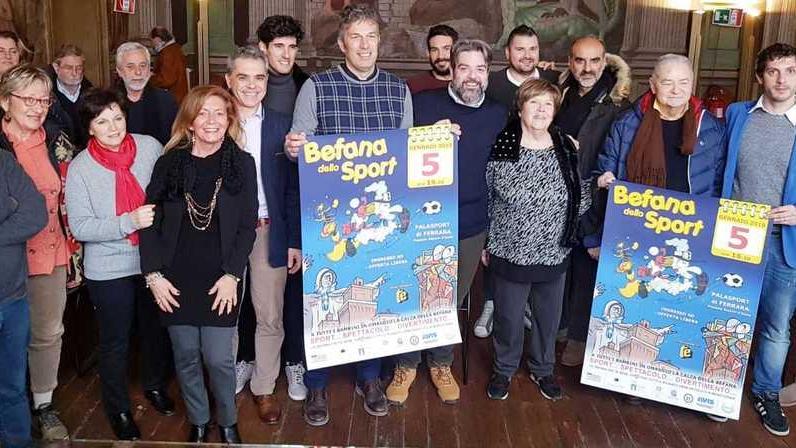 Con la torcia olimpica la Befana dello Sport accende la solidarietà