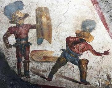 Pompei, nuova meraviglia: un affresco con due gladiatori