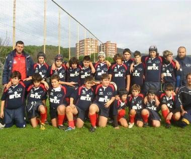 Qui e in alto a destra i piccoli rugbisti protagonisti a Brescia 