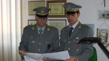 Finanzieri al lavoro