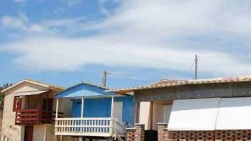 I quattro chalet sulla spiaggia a Carbonifera