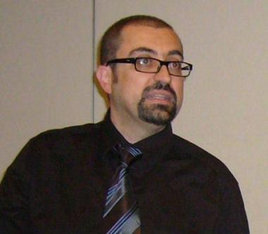 Insegnanti riuniti al Palazzo delle Esposizioni e a sinistra Alessandro Rapezzi 