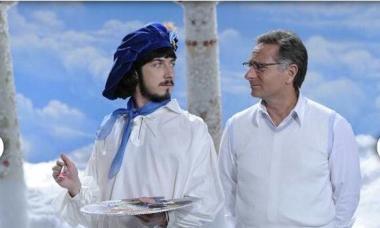 Eccolo con tavolozza e pennello, insieme a Paolo Bonolis 