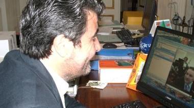 Una riunione di dipendenti a Palazzo Ducale e il presidente Stefano Baccelli