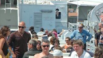 Turisti a bordo di una nave diretta all’Elba