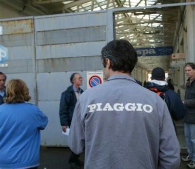 Operai allentrata della Piaggio 