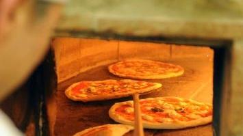 Una bella infornata di pizze
