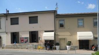 Il sindaco Millozzi; sopra il circolo del Botteghino