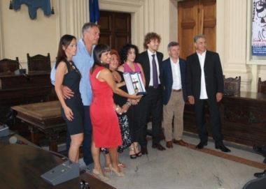 La banda in viale Verdi e, sopra, la consegna dellAirone alla famiglia Tesi 