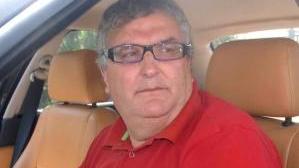 Renzo Mochi sulla sua auto