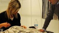 Operatori alla fiera tessile di Milano