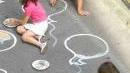 A sinistra la cerimonia dell’unzione a destra bimbi che giocano durante la festa