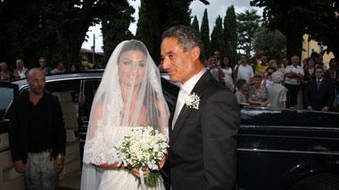 Le nozze della Gregoraci tengono banco: Briatore col figlio Nathan in chiesa