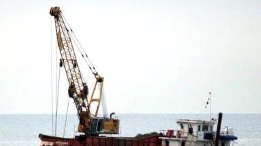 La draga al lavoro