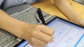 In classe con il computer