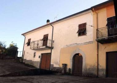 La casa dellanziana e in basso il sindaco Paolo Grassi     