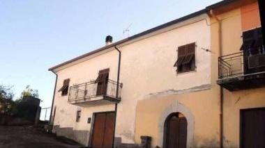 La casa dell’anziana e in basso il sindaco Paolo Grassi