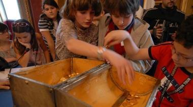 <b>GIOCO DI RUOLO.</b> Con monete di cioccolata 