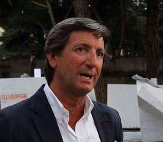 Una veduta del porto commerciale e il sindaco Angelo Zubbani 