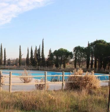 Limpianto delle piscine di Collesalvetti. In alto, Marco Valtriani 