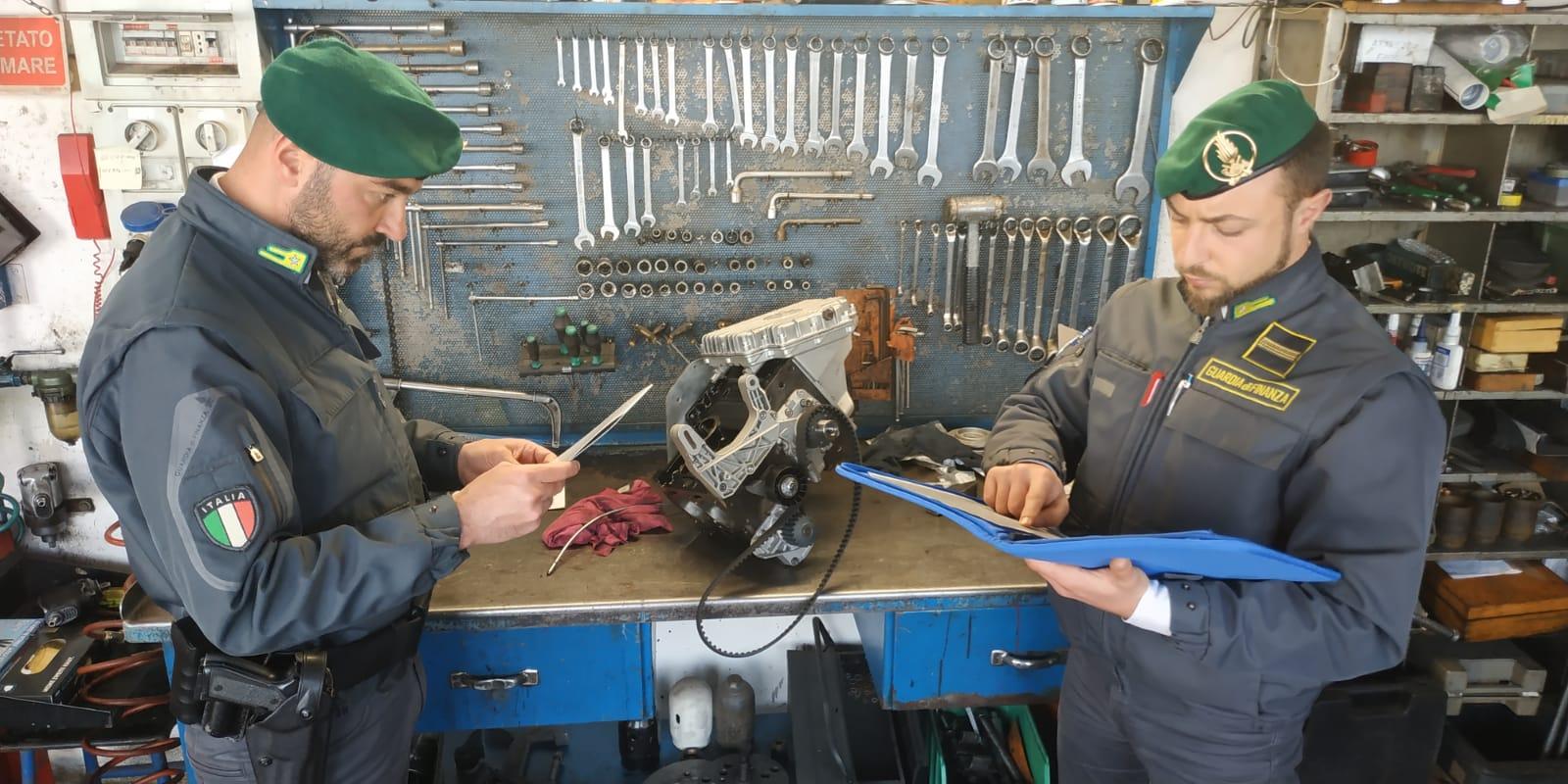 Due militari della guardia di finanza labronica al lavoro in una delle aziende controllate