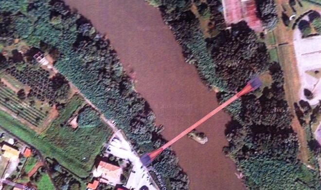 Un ponte pedonale tra Cascina a Uliveto