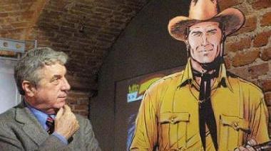 A sinistra un’immagine di Sergio Bonelli accanto a Tex Willer Sopra la copertina del primo numero di Dylan Dog