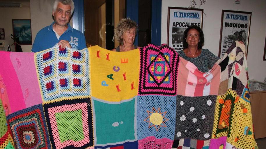Un chilometro di tappeto con i colori del mondo