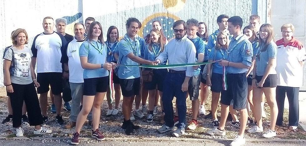 Murales degli scout riqualificano il muro di cinta dello stadio 