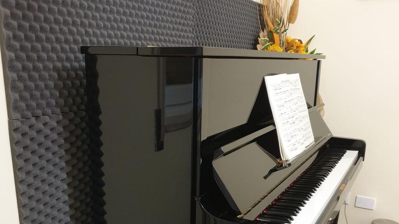 Pan Haoke (nel riquadro) e il suo pianoforte