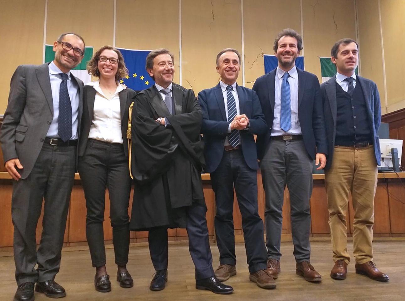 Tommaso Coletta (con la toga) insieme ad alcuni dei suoi sostituti e a Paolo Canessa (foto Gori)