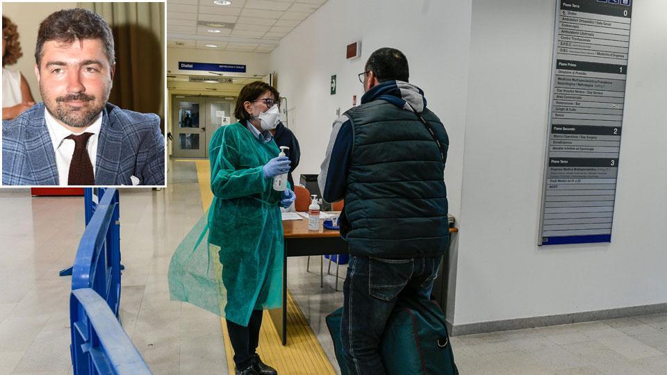 Controlli all’ingresso dell’ospedale San Luca e Enrico Torrini, referente SNA, Sindacato Nazionale Agenti Assicurativi