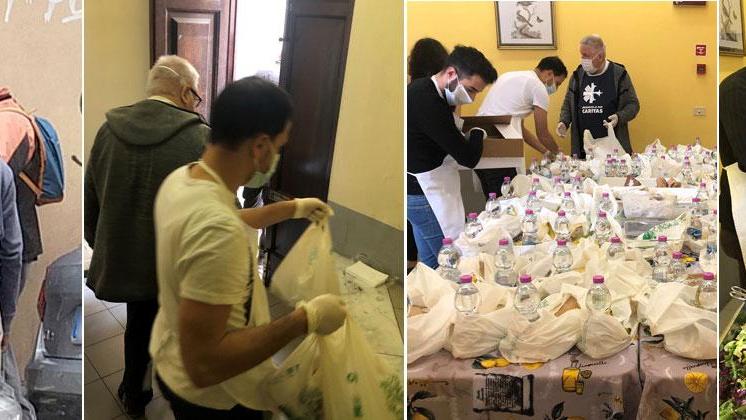 I volontari preparano il cibo e la spesa per chi ha bisogno