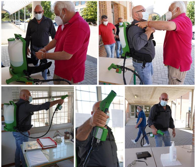 L’opera di sanificazione con l’atomizzatore elettrostatico effettuata nei locali dell’istituto Fermi di Pontedera (Foto silvi)