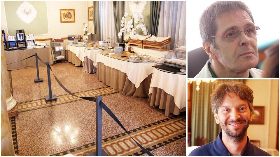 I distanziatori messi nella sala delle colazioni dell'hotel Ercolini & Savi, il titolare Fabio Cenni e Antonio Mariotti titolare dell'Hotel Adua